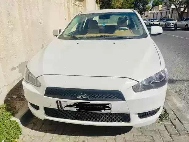 مستعملة Mitsubishi Lancer للبيع في الدوحة #7390 - 1  صورة 